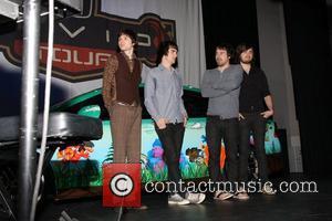 Brendon Urie, Ryan Ross, Jon Walker and Spencer Smith Panic at the Disco performs at Studio 540 at the American...