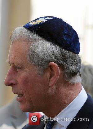 Prince Charles, Prince of Wales, wearing a Jewish yarmulka, attends the the opening of the Krakow Jewish Community Centre Krakow,...