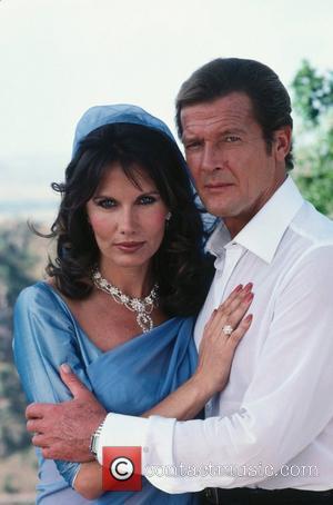 *SIR ROGER MOORE CELEBRATES HIS 80TH BIRTHDAY ON 14TH OCTOBER 2007  Maud Adams (as Octopussy) and Roger Moore (as...