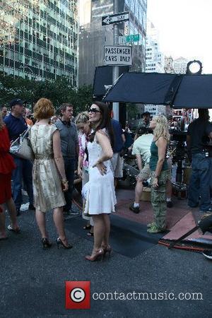 Kristin Davis, Sarah Jessica Parker, Cynthia Nixon The stars of 'Sex and the City: The Movie' appear together on set...