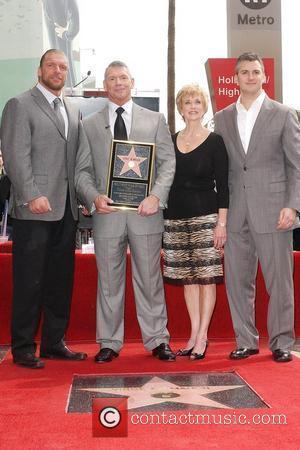 Triple H, Vince McMahon and wife, Shane McMahon Vince McMahon honoured with the 2357th Star on the Hollywood Walk Of...