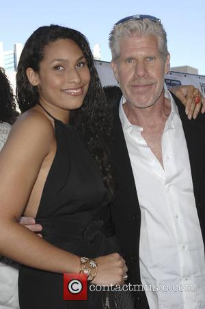 Ron Perlman with his daughter The 'Hellboy 2: The Golden Army' premiere at the Mann Village Theater Los Angeles, California...