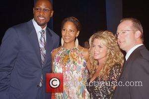 Alonzo Mourning, His Wife and Tracy Mourning