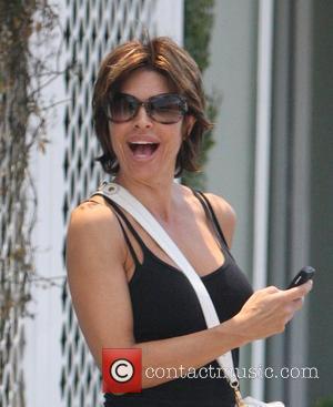 Lisa Rinna is in high spirits as she leaves Winsor Pilates Los Angeles, California - 17.07.08