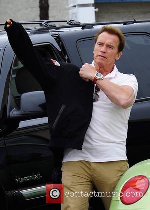 Arnold Schwarzenegger leaving a restaurant after having lunch with his family in Brentwood Los Angeles, California - 02.05.09