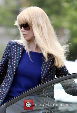 Claudia Schiffer drops her children off at school wearing sunglasses on an overcast day in London London, England - 18.05.09