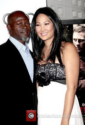 Djimon Hounsou and Kimora Lee Simmons  AFI Film Festival 2008 - Premiere of 'Defiance' - held at the Arclight...