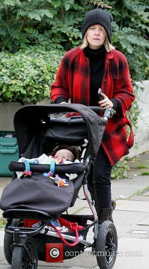 Edith Bowman pushes her son Rudy in a pushchair in North London London, England - 24.10.08