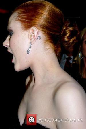 Evan Rachel Wood photographed with bad case of earwax Premiere of 'Whatever Works' during the 2009 Tribeca Film Festival held...