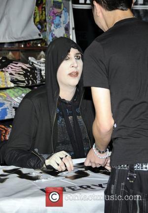 Marilyn Manson signs copies of his new album 'The High End of Low' at Hot Topic Hollywood Los Angeles, California...