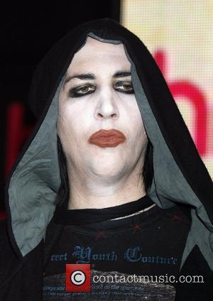 Marilyn Manson signs copies of his new album 'The High End Of Low' at HMV Oxford Circus London, England -...