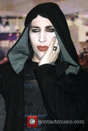 Marilyn Manson signs copies of his new album 'The High End Of Low' at HMV Oxford Circus London, England -...