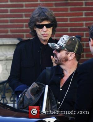 MICK JAGGER has fuelled speculation he's set to follow in pal DAVE STEWART's fashionable footsteps after meeting colourful designer CHRISTIAN...