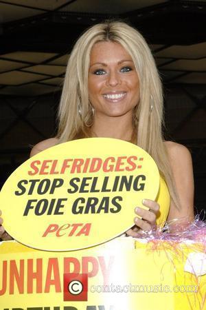Nicola McLean holds a PETA 'Unhappy Birthday, Selfridges! Drop Cruel Foie Gras' demonstration outside Selfridges store, Oxford street London, England...