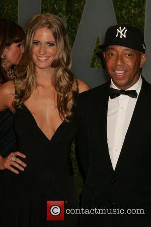 Russell Simmons and guest The 81st Annual Academy Awards (Oscars) - Vanity Fair Party Hollywood, California - 22.02.09