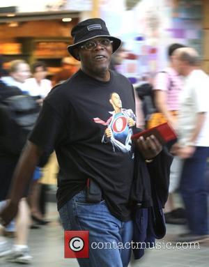 Samuel L. Jackson leaving LAX airport wearing a Barack Obama Superman t shirt, clearly indicating his political stance Los Angeles,...
