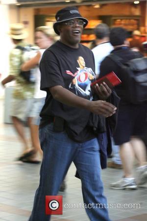 Samuel L. Jackson leaving LAX airport wearing a Barack Obama Superman t shirt, clearly indicating his political stance Los Angeles,...