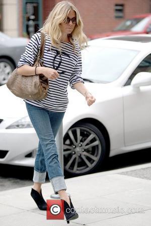 Sienna Miller outside the Anastasia Salon in Beverly Hills Salon wearing rolled up jeans Los Angeles, California - 29.05.09