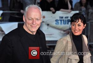 David Gilmour and guest 'The Age of Stupid' UK film premiere held at Leicester Square gardens in a solar powered...