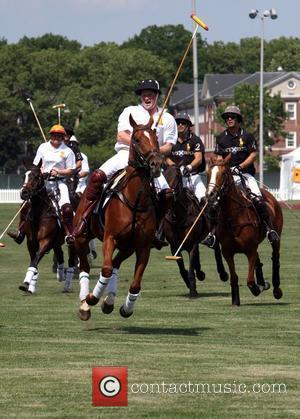 Prince Harry of Wales plays in the 2nd Annual Veuve Clicquot Manhattan Polo Classic held at Governors Island New York...
