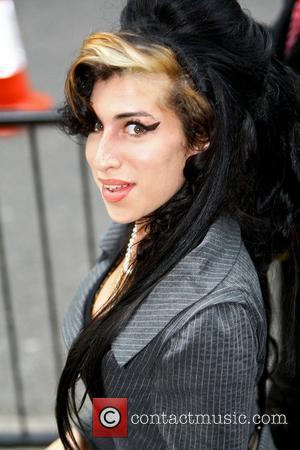 Amy Winehouse  arriving at City of Westminster Magistrates Court to face charges of assault London, England - 23.07.09