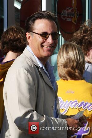 Andy Garcia,  arrives for the first game of the NBA National Championship Tournament between the L.A. Lakers and Orlando...