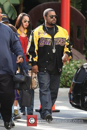 Ice Cube and Family arriving at the first game of the NBA National Championship Tournament between the L.A. Lakers and...