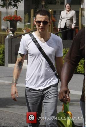 Linkin Park member Chester Bennington and his family leaving the Ritz Carlton Hotel.  Berlin, Germany - 21.07.09