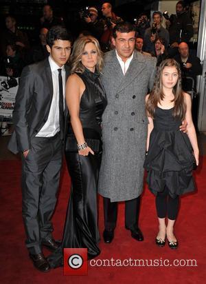 Tamer Hassan and family Dead Man Running - UK film premiere held at the Odeon Leicester Square. London, England -...