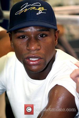 Floyd Mayweather celebrates Flag Day by wrapping the Mayweather Boxing Gym with the American flag Las Vegas, Nevada - 11.06.09