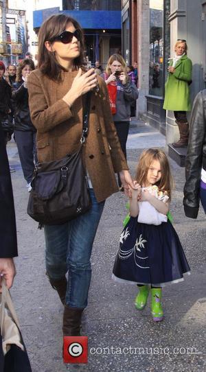 Katie Holmes, daughter Suri Cruise walking through New York, on their way to Balthazar restaurant New York City, USA -...