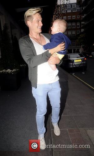 Lee Ryan  holds his baby son, Rayn Amethyst Ryan, while out and about London, England - 03.06.09