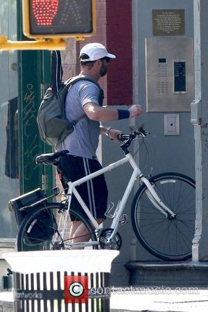 Liev Schreiber 'Taking Woodstock' star returning to his home in Noho after cycling around town New York City, USA -...