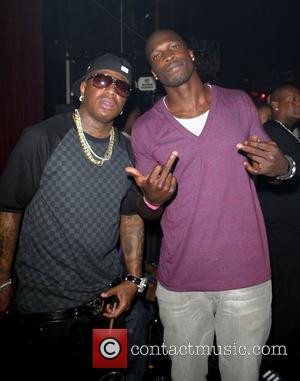 Birdman and Chad Ochocinco Lil' Kim's birthday celebration at Mansion nightclub Miami Beach, Florida - 23.07.09