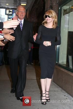 David Letterman welcomes Madonna outside Ed Sullivan Theatre for the 'Late Show With David Letterman' New York City, USA -...