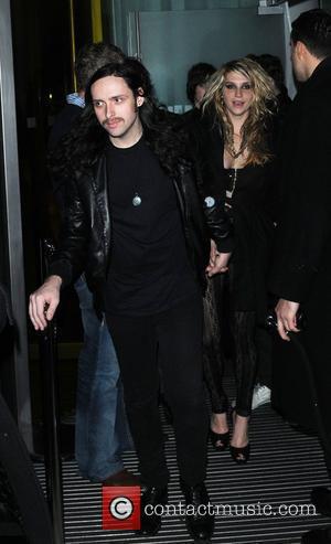 Kesha attends Mahiki's third birthday party, she leaves holding hands with a man and goes onto Bungalow 8 London, England...