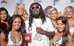 T-Pain and the Miami Dolphins Cheerleaders Miami Dolphins Cheerleaders Unveil 2010 Swimsuit Calendar with their annual fashion show at Casa...