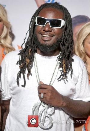 T-Pain Miami Dolphins Cheerleaders Unveil 2010 Swimsuit Calendar with their annual fashion show at Casa Casuarina Miami Beach, Florida -...