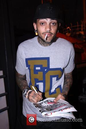 Travis McCoy signs autographs Paper Magazine and Ray-Ban present 'Sounds Like Paper' at the South Street Seaport New York City,...