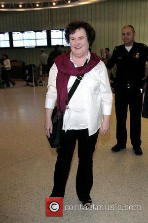 Susan Boyle  arrives at LAX airport on a British Airways flight from Heathrow and is mobbed by photographers, reporters...