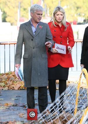 Holly Willoughby and Philip Schofield outside presenting a segment of ITV's 'This Morning' London, England - 04.11.09
