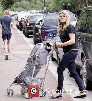 'Holby City' star Tina Hobley takes her daughters to Regents Park London, England - 20.07.09