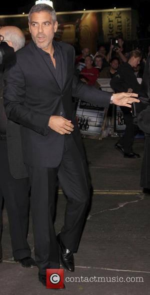 George Clooney arrive at the LA premiere of 'Up In The Air' at the Mann Village Theatre Westwood, California -...