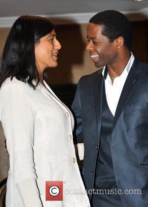 Adrian Lester and guest Women In Film And TV Awards held at the London Hilton, Park Lane. London, England -...