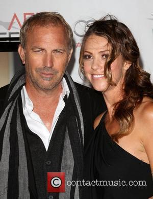 Kevin Costner and wife Christine Baumgartner AFI Fest 2010 - 'The Company Men' screening held at Grauman's Chinese Theatre -...
