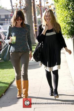 Alicia Silverstone leaving the vegetarian restaurant Real Food Daily in West Hollywood after having lunch with a friend Los Angeles,...