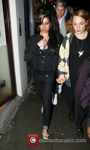 Amy Winehouse leaving a bar in Great Compton Street, Soho with friends in the early hours of this morning. The...