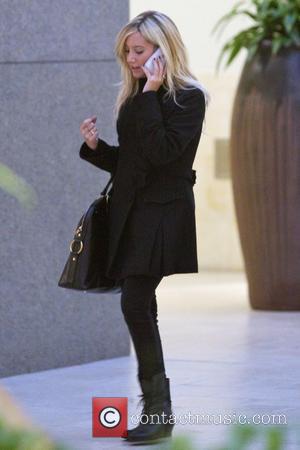 Ashley Tisdale talking on her phone while out shopping with her mother Los Angeles, California - 10.12.09