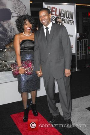 Actor Denzel Washington & Paulette Washington Los Angeles Premiere of 'The Book Of Eli' held at the Grauman's Chinese Theater...