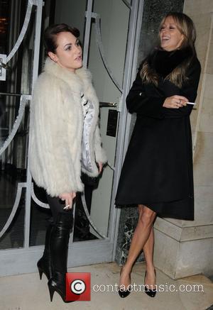 Jamie Winstone and a friend smoking cigarettes outside the Dior private dinner, held at Claridges Hotel. London, England - 25.11.10